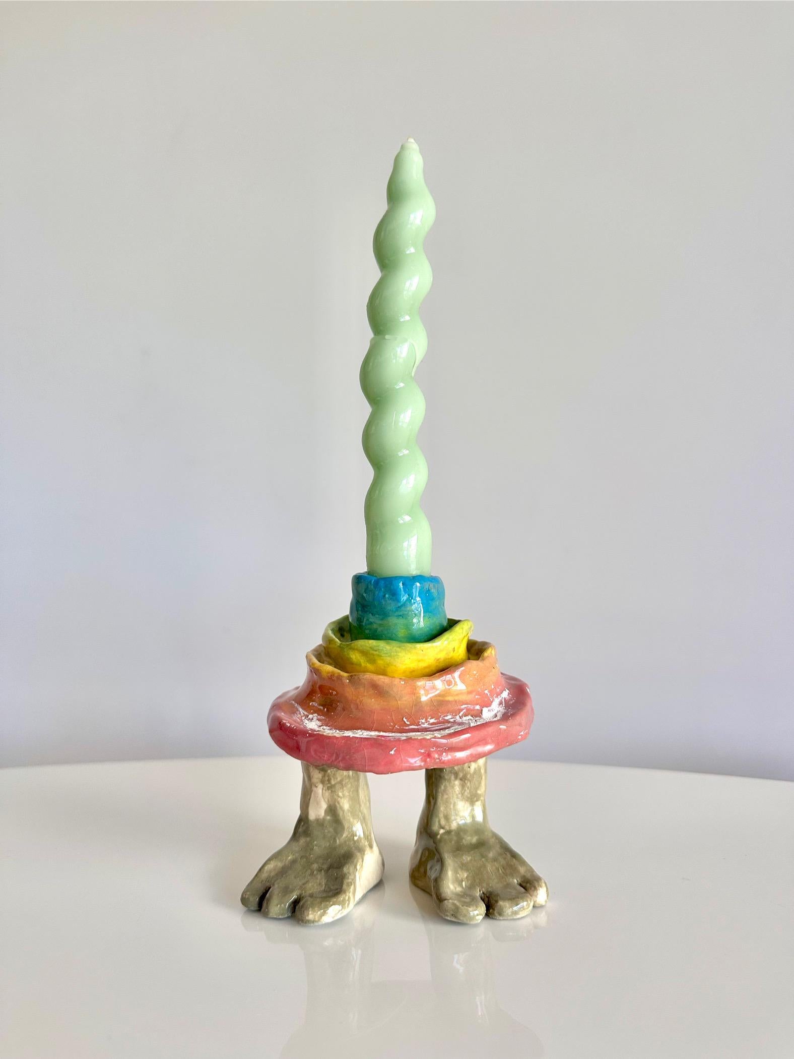 rainbow layered mud cake sculpture