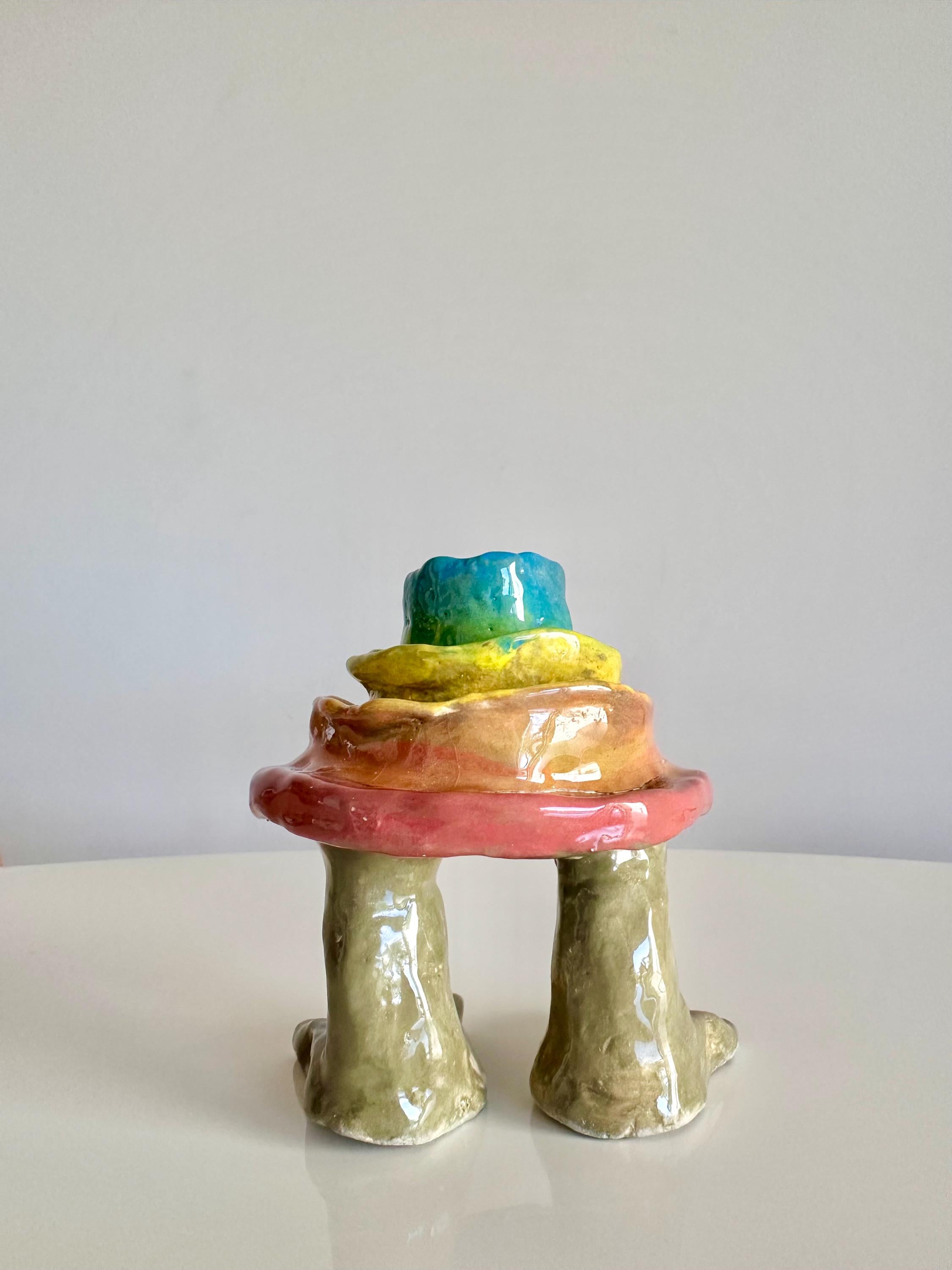 rainbow layered mud cake sculpture